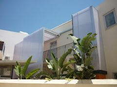 Συρόμενη οροφή και πλαγιοκάλυψη σε συνεργασία με το Αρχιτεκτονικό γραφείο Koutsoftides Architects