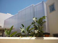 Συρόμενη οροφή και πλαγιοκάλυψη σε συνεργασία με το Αρχιτεκτονικό γραφείο Koutsoftides Architects